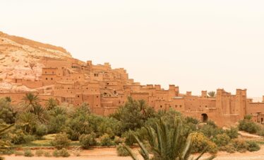 Explore the historic Ait Ben Haddou, a UNESCO World Heritage site in Morocco's desert landscape.