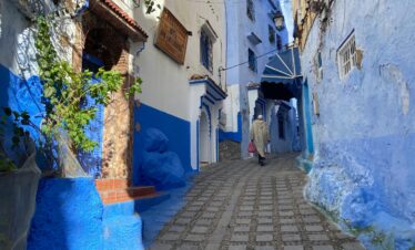 Explore the iconic blue streets of Chefchaouen, Morocco, known for vibrant architecture and cultural charm.